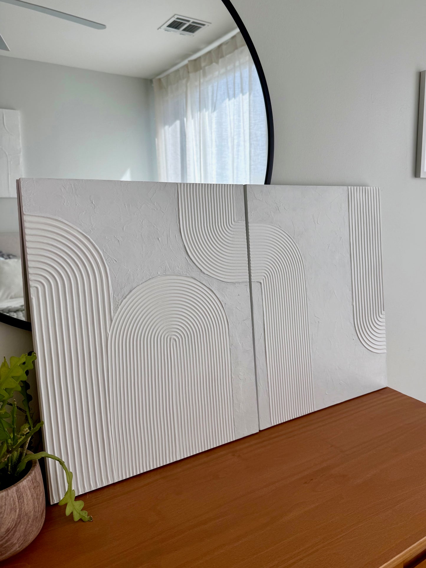 Decorative wall panels with geometric pattern in a room setting
